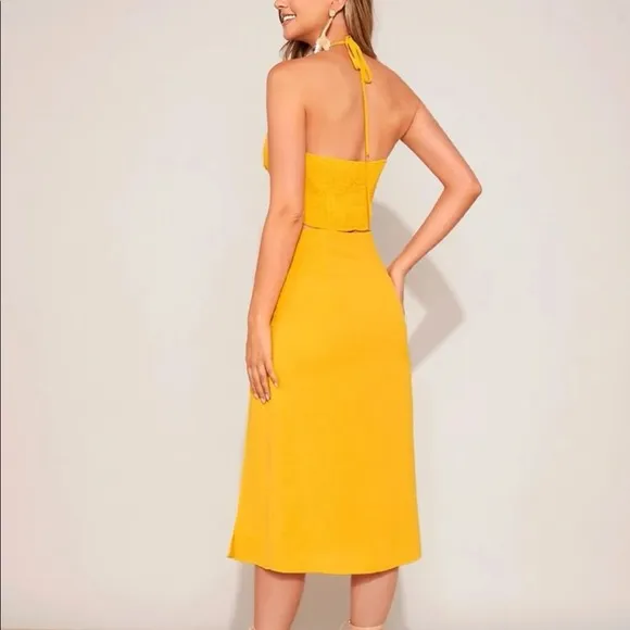 Backless crop halter top and split thigh skirt