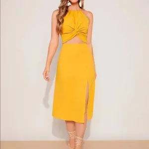 Backless crop halter top and split thigh skirt