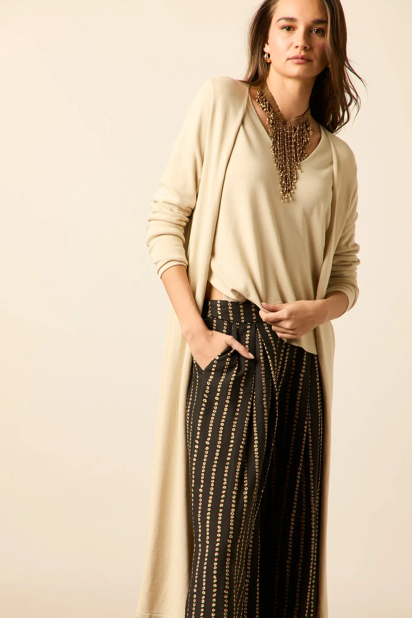 Chaqueta larga punto beige