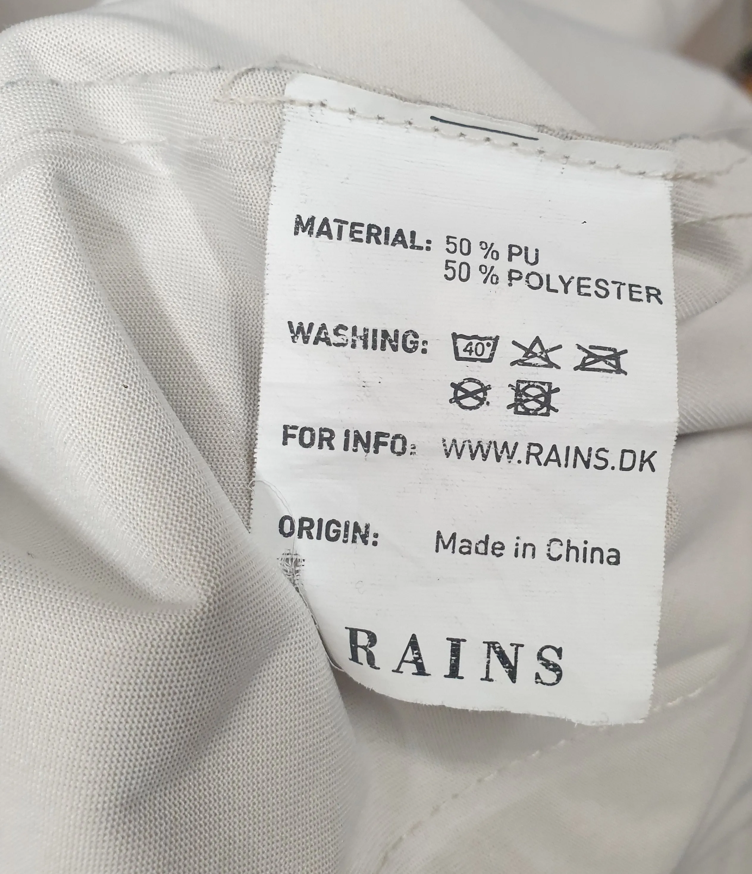Rains beige raincoat size ML